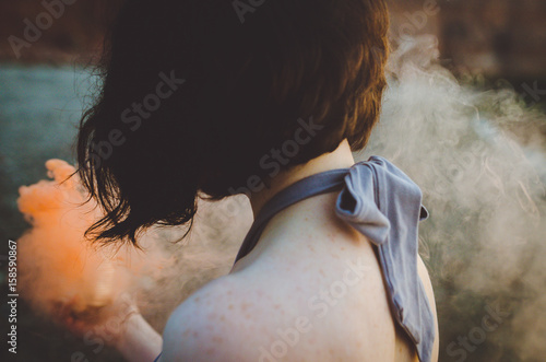 A Woman with a Smoke Bomb