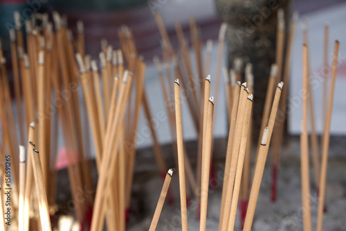 Closed up detail of burning incense sticks