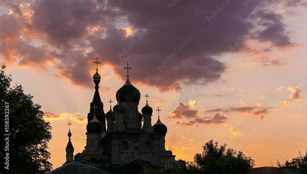 silhouette of orthodoxy church at sunset