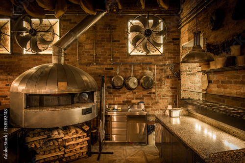 Pizza oven in open kitchen italian restaurant