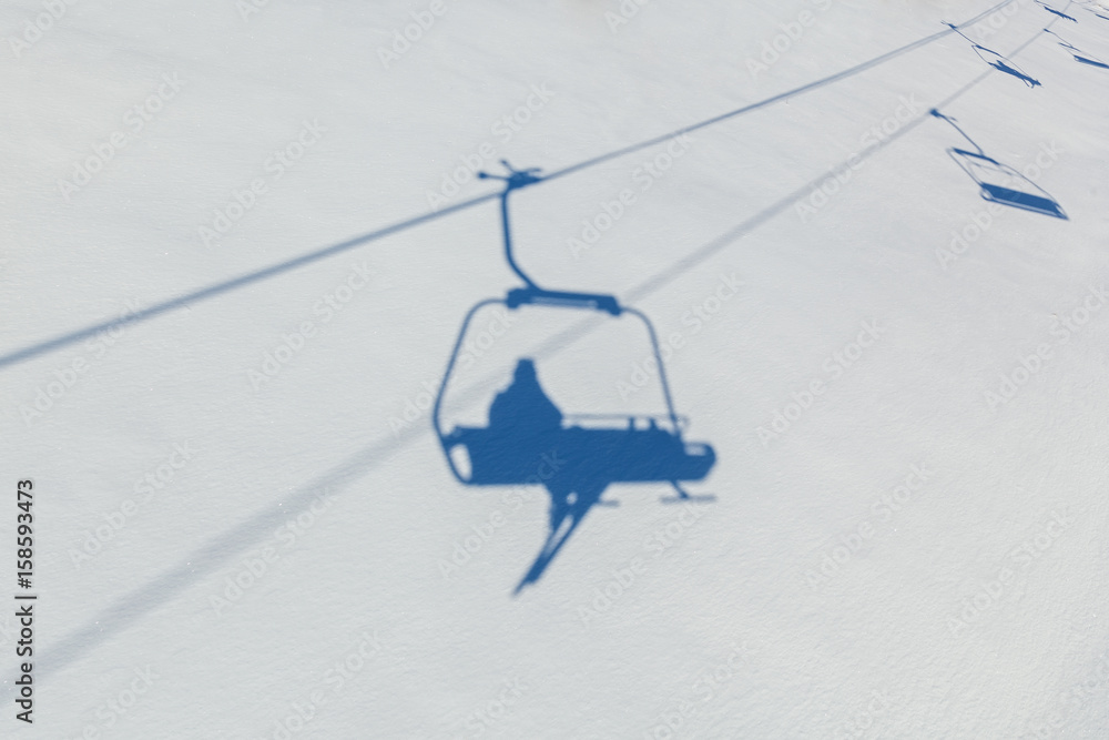 shade of skier on to snow shade of skier on to snow