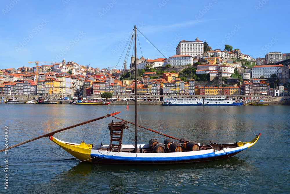 Porto, Portugal - 2nd May, 2017: Rabelo (traditional portuguese cargo boat) on Rio Douro and Ribeira (old town), a Unesco World Heritage