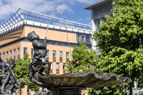 Germany, Baden-Wuerttemberg, Mannheim, Quadrat O1, Paradeplatz, Planken: Details of fountain sculptures of Grupello-Pyramide in the city center photo