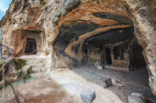 Travel to Georgia - room in artificial ancient cave city in Vardzia. Most popular georgian attraction photo