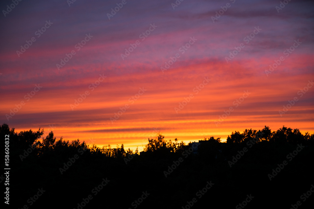 Fototapeta premium Bright sunset over the city of Khabarovsk