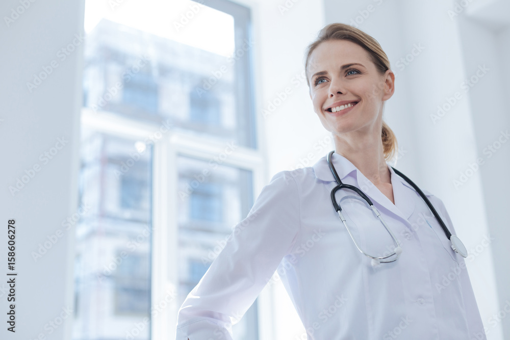 Delightful practitioner working in the clinic Delightful practitioner working in the clinic