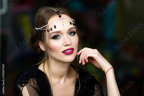 Portrait of a beautiful girl in a black negligee
