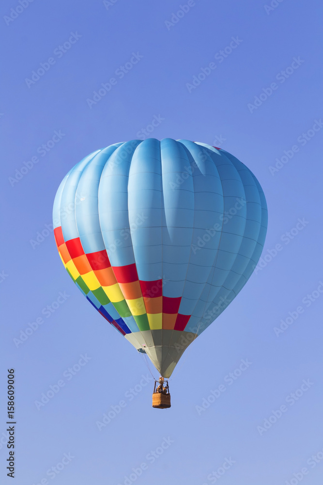 Naklejka premium Balloon floating above winery at Temecula Balloon Festival in Southern California