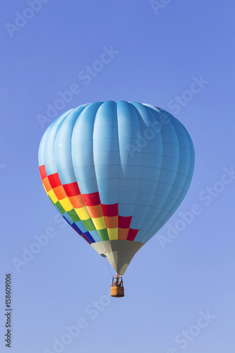 Balloon floating above winery at Temecula Balloon Festival in Southern California