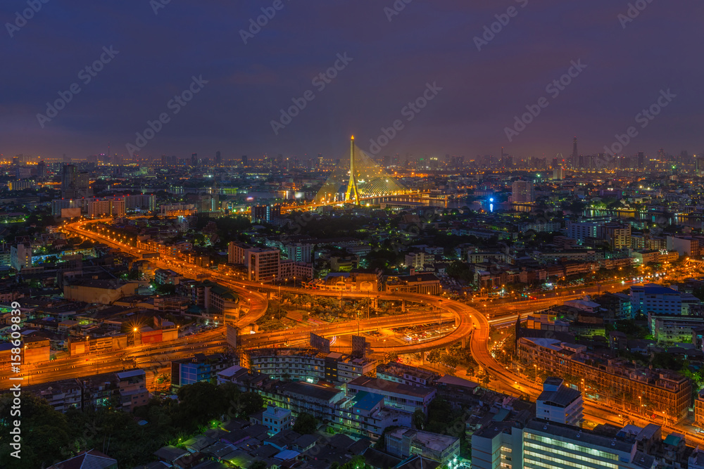 Aerial view of highway junction at night in Bangkok, Thailand
