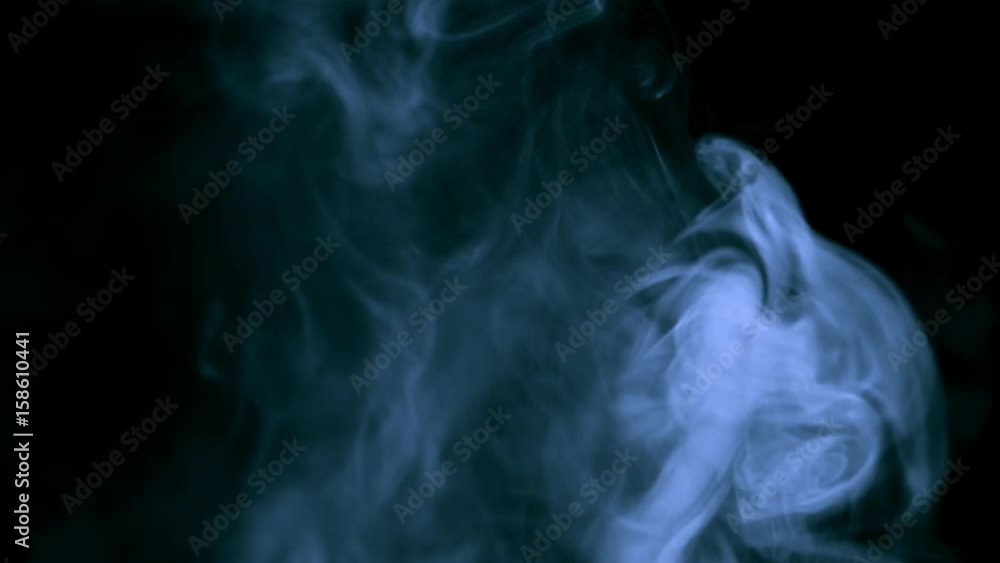 White cloud of cigarette smoke on black isolated background White cloud of cigarette smoke on black isolated background