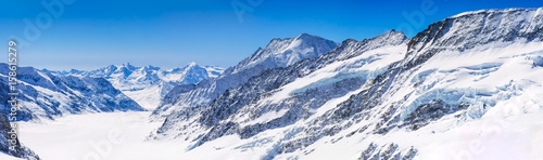 Jungfraujoch, Switzerland - April 29, 2017: Panorama view of the Alps mountains from the view of Jungfraujoch station, Switzerland..