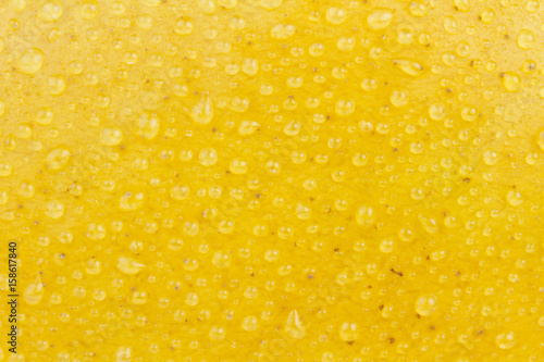 Fresh mango with water dew  texture background