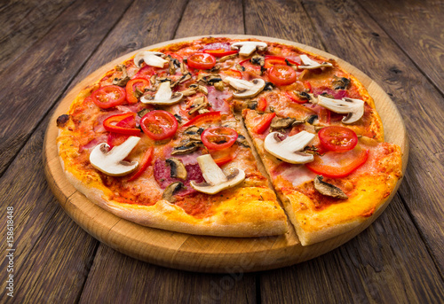 Delicious pizza with mushrooms and pepperoni