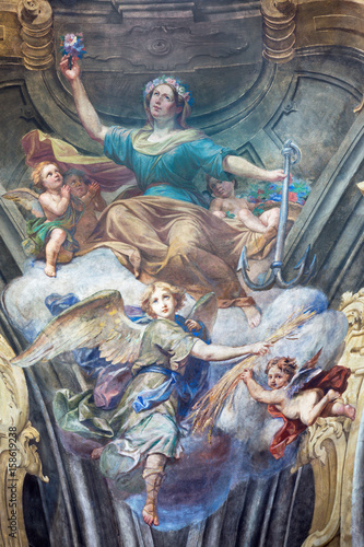 TURIN, ITALY - MARCH 13, 2017: The fresco of cardinal virtues of Hope in cupola of Chiesa della Visitazione by Michele Antonio Milocco  (1690 - 1772). photo