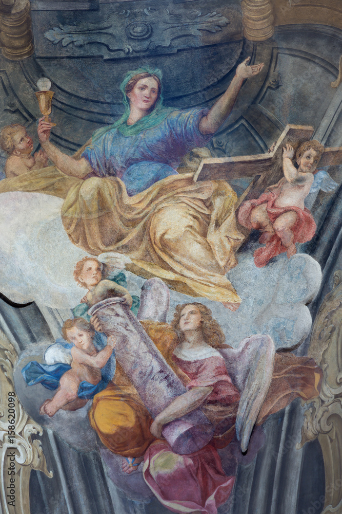 TURIN, ITALY - MARCH 13, 2017: The fresco of cardinal virtues of Faith in cupola of Chiesa della Visitazione by Michele Antonio Milocco  (1690 - 1772).