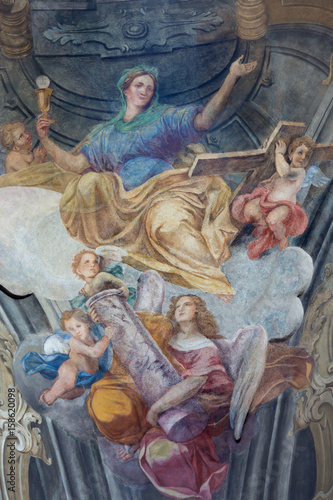 TURIN, ITALY - MARCH 13, 2017: The fresco of cardinal virtues of Faith in cupola of Chiesa della Visitazione by Michele Antonio Milocco (1690 - 1772).