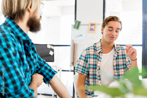 Two office workers at the desk