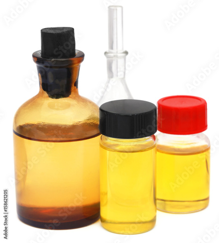 Oil jars over white background