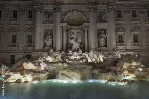 Fontana di trevi fountain at night, Rome, Italy.