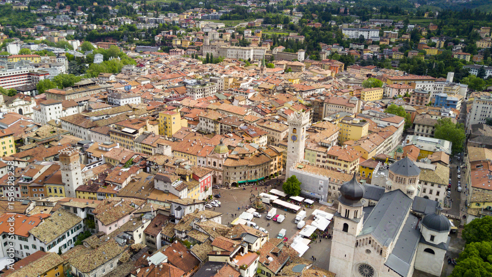 Aerial video shooting with drone on Trento, famous Trentino city near the Adige river in northern Italy