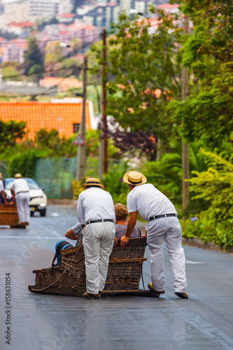 Toboggan riders on sledge in Monte - Funchal Madeira Portugal