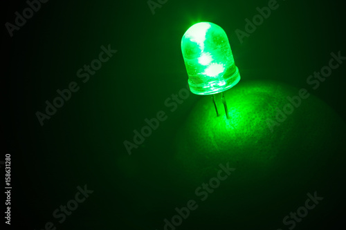 green light led from lime or lemon Natural energy on black photo