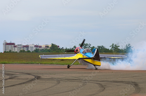 Third AirFestival at Chaika airfield. The pilot is showing mastery of control his plane on the ground. Kyiv (Kiev). Ukraine photo