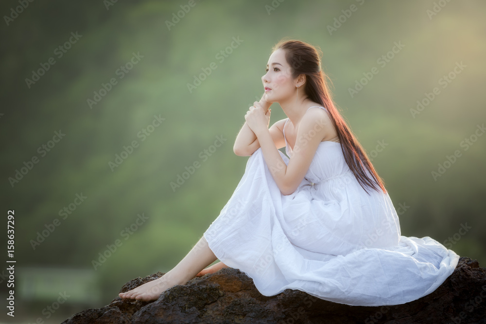 Young Girl In A White Dress In The Countryside In Spring. Beautiful Girl  With White Flowers Stock Photo, Picture and Royalty Free Image. Image  54716878.