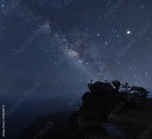 Starscape photographer with a milky way