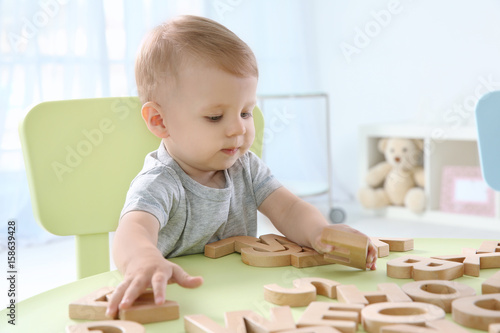 Cute little child playing w...