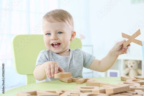 Cute little child playing w...