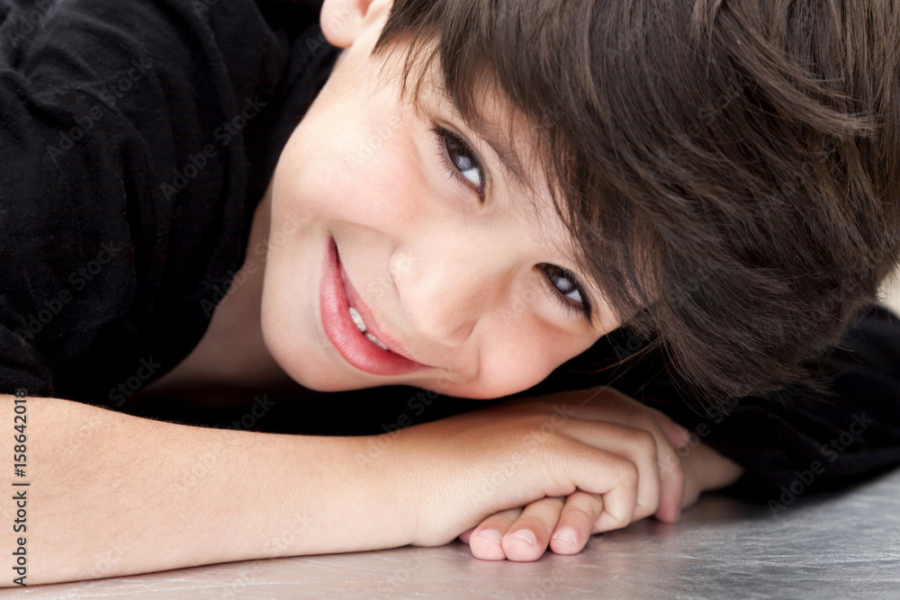 Little boy portrait close up face, lying down Little boy portrait close up face, lying down