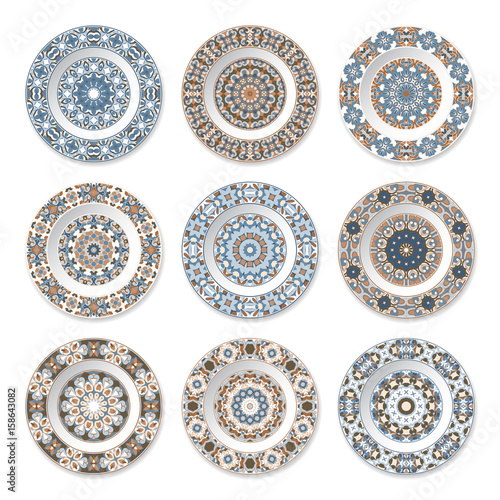nine decorative plates with circular colored pattern