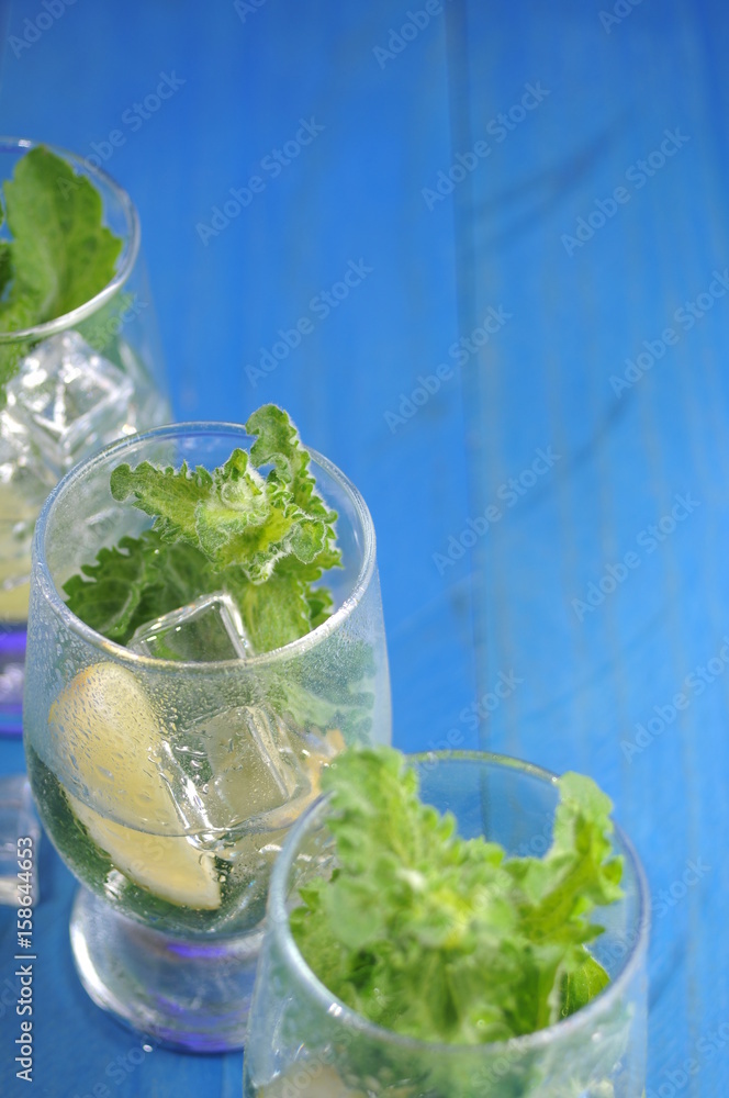 Mojito cocktail with lime and mint Mojito cocktail with lime and mint