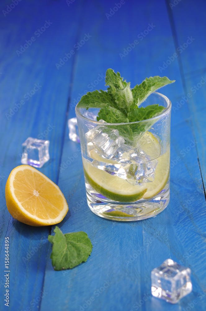 Mojito cocktail with lime and mint Mojito cocktail with lime and mint