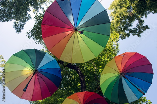 Three colorful umbrella in the color spectrum