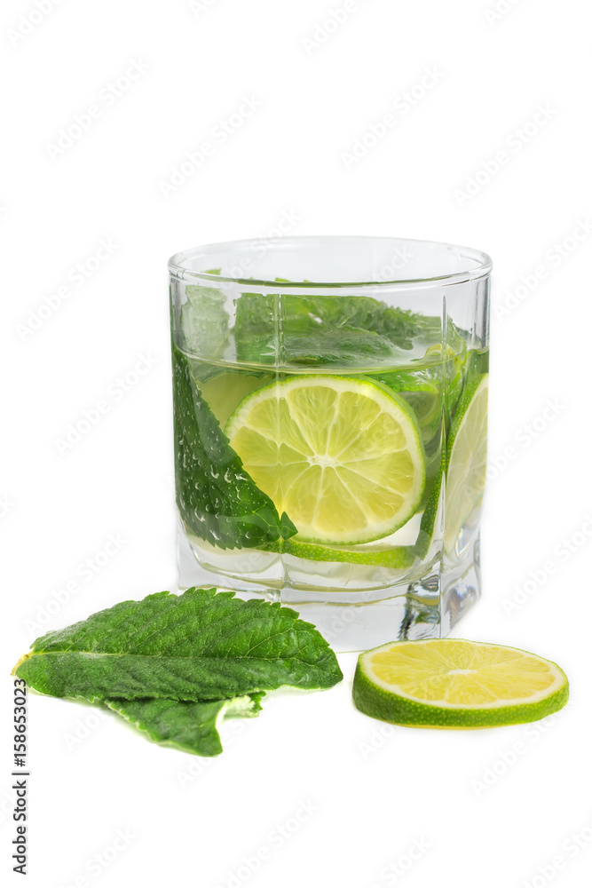Refreshing drink with lime and mint on a white background Refreshing drink with lime and mint on a white background