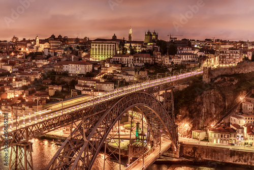 Porto, Portugal: the Dom Luis I Bridge and the old town at night 
