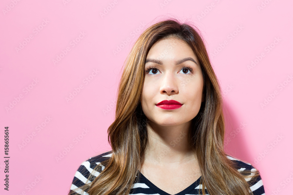 Portrait of a young woman standing Portrait of a young woman standing