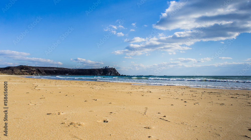 The sandy beach of the sea of Japan on the shores of the Primorsky territory The sandy beach of the sea of Japan on the shores of the Primorsky territory