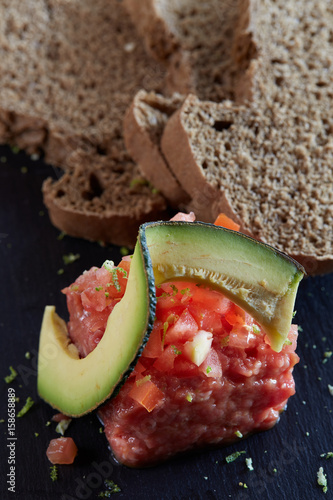 beef tartar with avocado and tomatoes