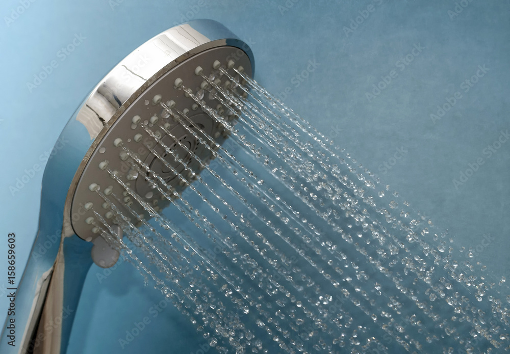 Shower head with running water close up Shower head with running water close up