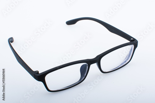 black frame spectacles isolated on white background close up