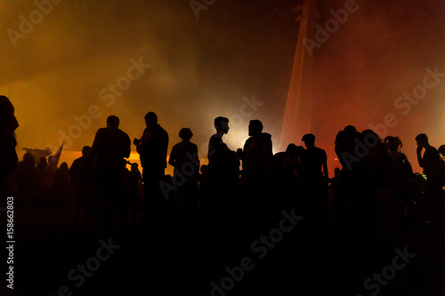 Silhouettes Of Protesters