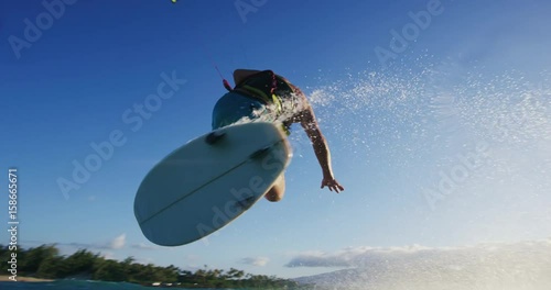 Young Man Kite Surfing in Slow Motion