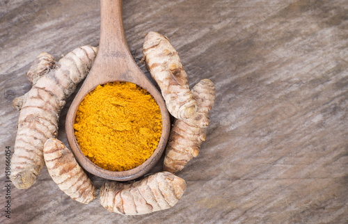 Roots and turmeric powder (Curcuma longa)