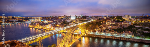 Porto, Portugal: the Dom Luis I Bridge and the old town at sunset 