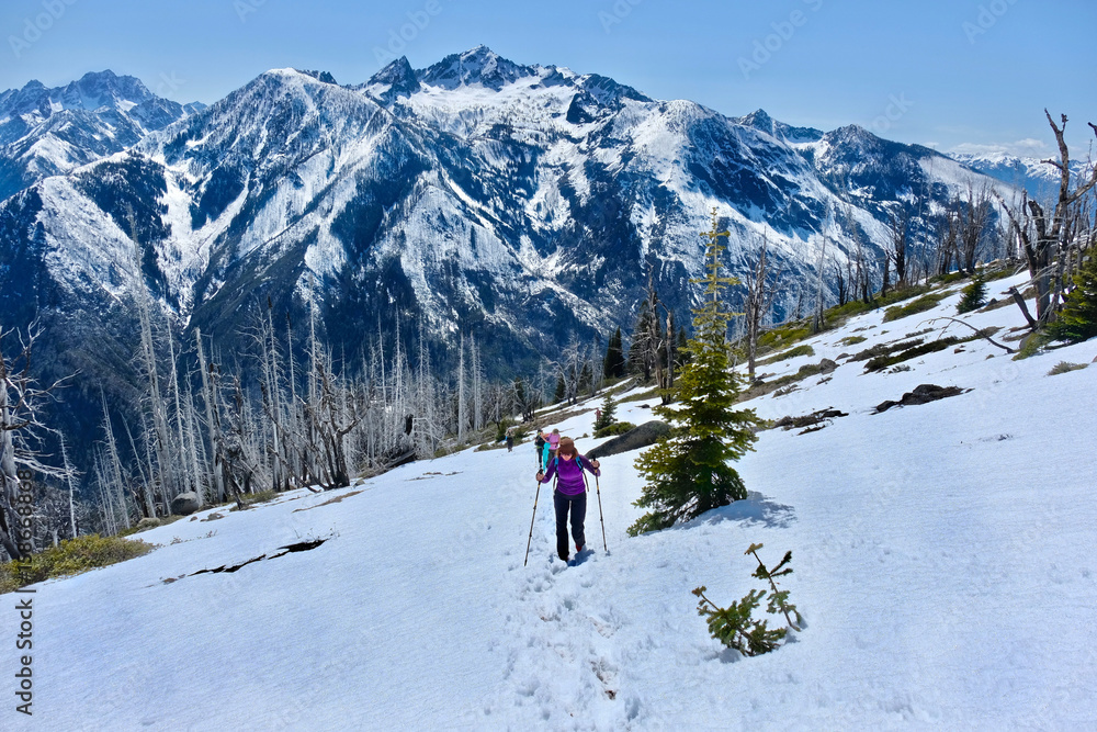 Group of friends hiking in mountains.  Icicle Ridge in Central Cascade Mountains. Leavenworth. Seattle. Washington. United States.