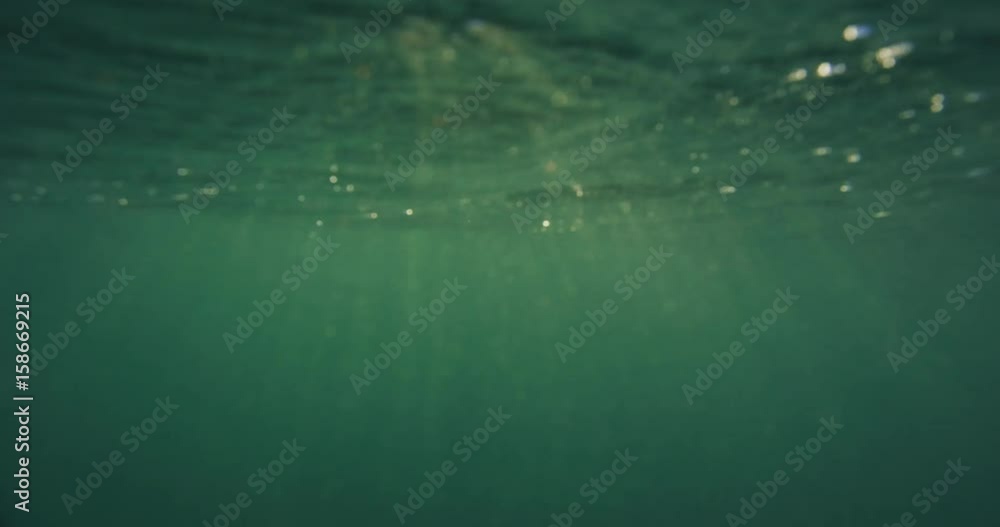 Underwater Surface With Rays of Light. Underwater Surface With Rays of Light.